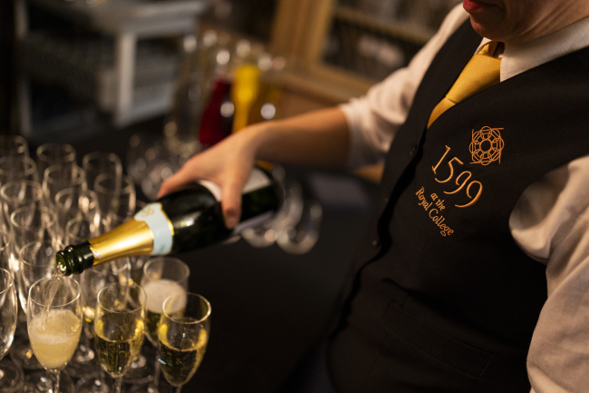 drinks being poured by 1599 team member